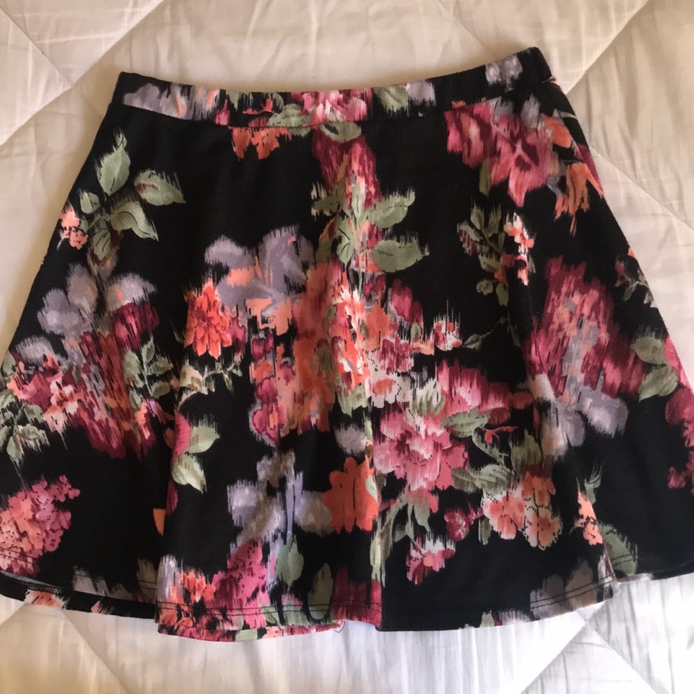 Black floral mini skirt